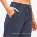 Damas Pantalones de chándal Drawstring Back Selastic Gym Jogger Pantalones Pantalones de atletismo Pantalones deportivos Joggadores